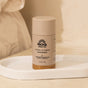 A Pacha Soap Co. Deodorant stands upright on a white tray with a beige background, featuring 24-hour odor protection and an aluminum-free formula gentle enough for sensitive skin.