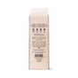 A beige Pacha Soap Co. Hand Soap Refill carton stands upright against a white background, displaying black text with scent notes, usage instructions, and company info—featuring shea butter and sustainably sourced palm oil.