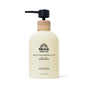 A 12.5 fl oz bottle of Pacha Soap Co. Liquid Hand Soap in White Blossom & Fig scent, featuring a black pump dispenser with wooden collar and enriched with shea butter.