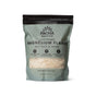Pacha Soap Co. Salt Soak comes in a 32-ounce resealable bag with a green and white design and clear window. The mineral-rich Magnesium Flakes in Sea Salt & Moss are perfect for a soothing bath soak.