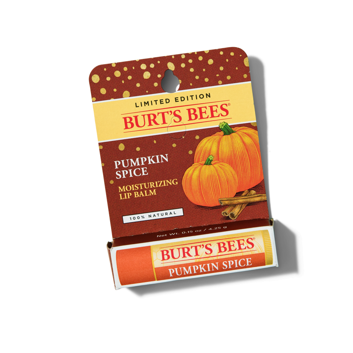 Burts Bees limited edition Pumpkin Spice moisturizing lip balm in orange packaging with an illustration of pumpkins and cinnamon sticks on the cardboard backing.