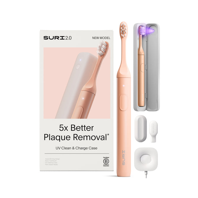 The SURI 2.0 Sonic Toothbrush with UV Travel Case includes a charging base, travel case, two brush heads, and boasts 5x Better Plaque Removal—ideal as your travel electric toothbrush.