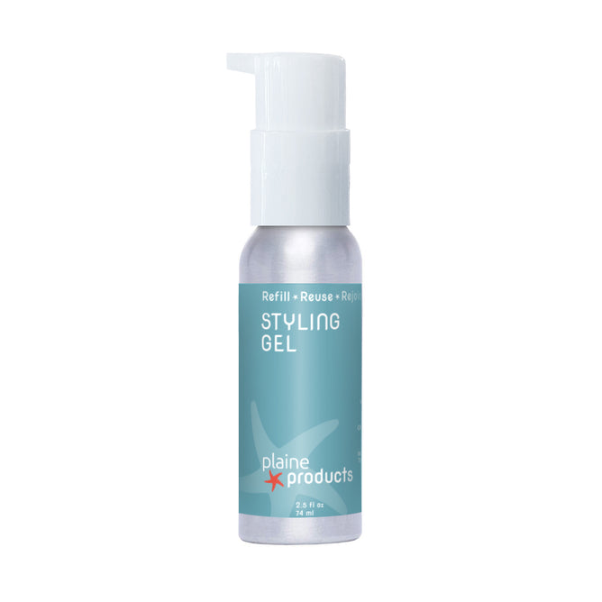 A 2.5 fl oz (74 ml) silver pump bottle of Plaine Products Styling Gel features a blue label with the Plaine Products logo and “Refill • Reuse • Rejoice”—a refreshing aloe hair gel among vegan hair products.