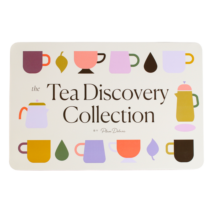 A rectangular sign featuring Tea Gift Tin - Tea Discovery by Plum Deluxe in bold text, surrounded by vibrant teapots, cups, and tea leaves—ideal for tea lovers or as a display for your favorite gift tins.