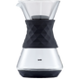 The SAKI Pour-Over Glass Coffee Maker features a black textured silicone grip, a stainless-steel mesh filter, and the SAKI logo displayed on the lower part of the carafe, making it a sleek and practical addition to your pour-over coffee maker collection.