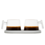 The Pure Over Espresso Cup Set features two glass cups with clear handles, filled with dark coffee and rich crema, placed side by side on a white tray against a plain white background.