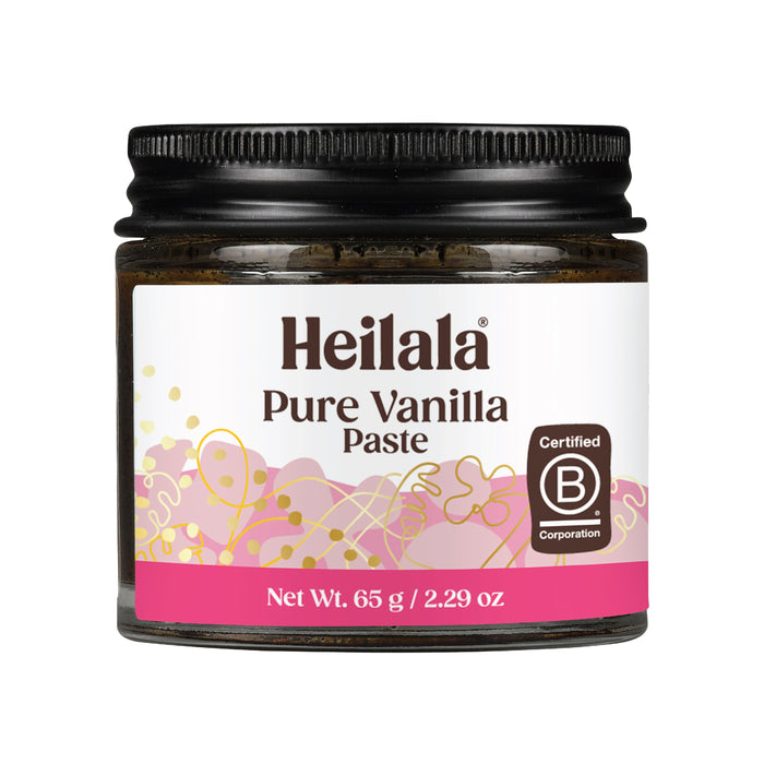A 65g (2.29oz) jar of Heilala Vanilla Paste with a black lid and white label accented with gold and pink. Made from real vanilla beans, this premium baking ingredient is Certified B Corporation.