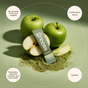 A Rookie Wellness Greens sachet sits atop green apple powder, surrounded by fresh green apples. Circular highlights showcase 18 fruits/veggies, probiotics for gut health, an antioxidant blend, and 3g fiber per serving.