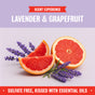 A halved grapefruit and wedges with lavender sprigs rest on a light background. Text above reads Scent Experience: Lavender & Grapefruit; below, Rebel Green Fresh Laundry Detergent Liquid, 3x Concentrated, USDA certified, sulfate free.