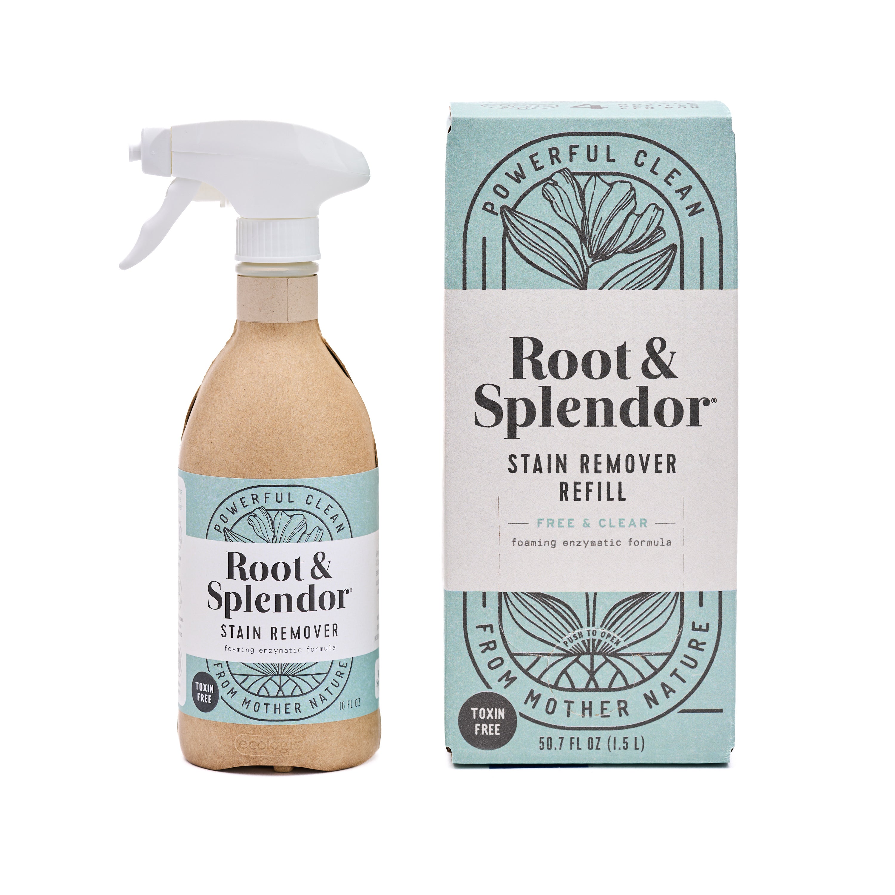 A bottle of Root and Splendor Stain Remover Refill with a spray nozzle stands beside its matching box, both labeled “Powerful Clean,” “Stain Remover Refill,” “Toxin Free,” and “From Mother Nature.”.