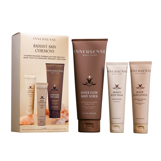 Innersense Organic Beauty's Radiant Skin Ceremony boxed set includes three essentials: an antioxidant scrub, Awaken Body Wash, and a moisturizing body lotion, all displayed together in front of the box.