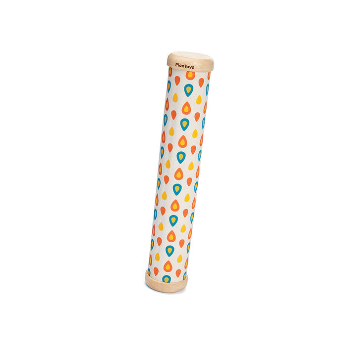 The PlanToys Rain Maker Toddler Toy is a cylindrical sensory toy featuring wooden ends and a blue, yellow, and orange teardrop pattern on white—a sustainable choice for play.