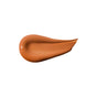 A smooth, teardrop-shaped swatch of RMS Beauty ReFresh Eye Brightener Broad Spectrum SPF 30 in medium brown is displayed on a white background.