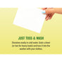 A hand with light blue nails holds a Rebel Green Laundry Detergent Sheet above text: Just Toss & Wash. These white, dissolvable sheets work in cold water—simply toss one in for sustainable laundry!.