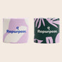 Two rolls of Repurpose Bamboo Toilet Paper 3ply (300 sheets) are side by side—one with a pink and white abstract design, the other with a dark green and pink leaf pattern. Both feature the Repurpose logo.