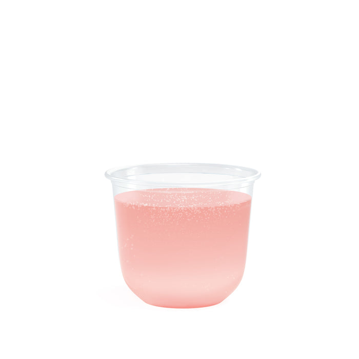 A Repurpose Stemless Cold Cup, filled with pink liquid, sits against a white background. Fizzy bubbles rise to the surface, creating an inviting display.