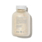 Naturally London’s Revitalizing Foot Soak comes in a clear, white-capped bottle filled with off-white crystals. The back label provides instructions, ingredients, and details in blue text to help soothe dry, itchy skin.