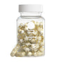A clear bottle labeled "Women's Multivitamin 18+" by Ritual holds 60 vegan, clinically backed capsules with Omega-3 DHA. The yellow, translucent capsules with white beads and a white cap; two are shown in front of the bottle.