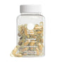 A clear plastic bottle labeled Ritual Women's Prenatal Multivitamin, featuring tan vegan capsules with choline and omega-3 DHA, is shown with a white lid and several capsules displayed in front.