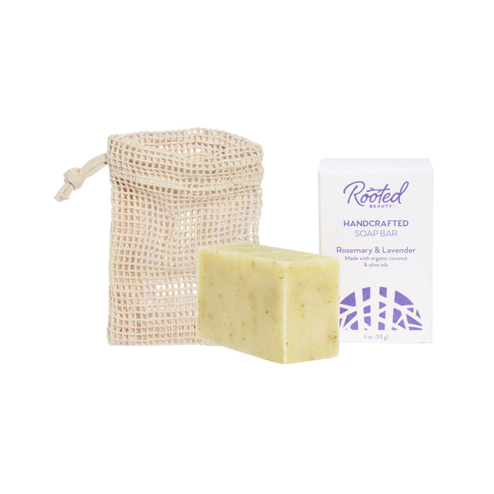 The Grove Collaborative Bar Soap + Saver Bag Duo is shown against a white background, featuring a soap saver bag, a handcrafted soap bar, and a branded box labeled Rosemary & Lavender.