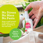 A hand sprays Earthkind Stay Away® Mosquitoes Insect Repellent - Up to 14-Hour Protection near a tote bag with greenery. Text reads: “No Stress No Mess No Pests. Safe for Children + During Pregnancy.” Long-lasting family tick defense.