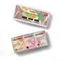 The Sparkle Bright Three Soap Gift Set by Soap Distillery features three festive bars—Hot Toddy, Mulled Wine, and Peppermint Hot Cocoa—made with natural ingredients and adorned with colorful holiday designs.