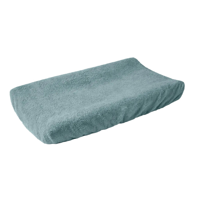 The Coyuchi Cloud Loom™ Organic Changing Pad Cover features a soft, light blue terry cloth with a contoured shape, shown against a plain white background.