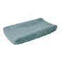 The Coyuchi Cloud Loom™ Organic Changing Pad Cover features a soft, light blue terry cloth with a contoured shape, shown against a plain white background.