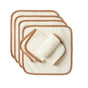 A set of six Cloud Loom™ Organic Baby Wash Cloths by Coyuchi, crafted from ultra-soft, cream-colored organic cotton with brown trim, are stacked and slightly offset against a plain white background. One cloth is rolled and placed on top, making them perfect for baby care.