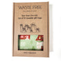 A Waste Free Celebrations cardboard box labeled Sew Your Own Set of 10 gift bags - Folk Art Cottages contains materials for 10 reusable bags, reveals festive fabric in a window, includes an online tutorial, and notes it’s made in Afghanistan.