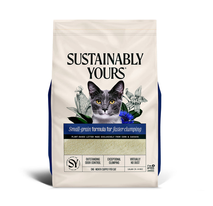 The Sustainably Yours 13lb eco-friendly cat litter bag displays a grayscale cat face and green text highlighting the plant-based small-grain formula made from corn and cassava, offering odor control and clumping benefits.