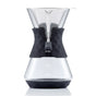 The Saki Pour-Over Glass Coffee Maker has a black silicone grip, reusable stainless steel mesh filter, and clear volume markings at 200, 400, and 600 mL.