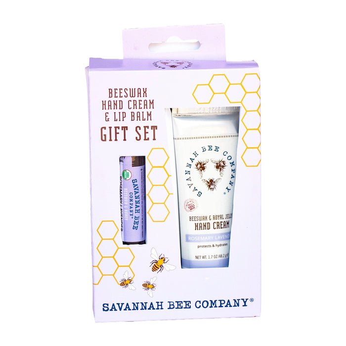 Gift set box featuring Savannah Bee Company’s Hand Cream & Lip Balm Gift Set – Rosemary Lavender, beautifully decorated with honeycomb and bee illustrations. The box reads “Hand Cream & Lip Balm Gift Set – Rosemary Lavender” and includes a window displaying the luxurious products inside.