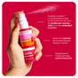 A hand sprays a fine mist of Shielded Beauty Face the Day Purifying Mist, featuring microbiome-balancing Guardian Complex to purify and protect, hydrating Sodium PCA, and soothing Marigold Extract.