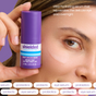 A person holds a purple bottle of Shielded Beauty Night Life Live Probiotic Eye Serum near their face, showing a streak of cream under their eye. Text highlights its ultra-hydrating and brightening effects for the delicate under-eye area.