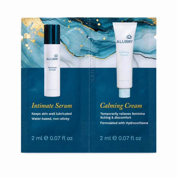 Two Alubri Intimate Serum & Calming Cream sample packets, featuring blue and gold marble packaging with detailed product information and usage instructions—emphasizing the Intimate Serum’s benefits for supporting a balanced vaginal microbiome—printed beside each tube.