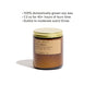 Seasonal Mini Candle Gift Set featuring an amber glass soy wax candle with a gold lid and a tan label reading No. 05: Spruce Soy Candle, with bullet points above listing wax type, burn time, and scent intensity.