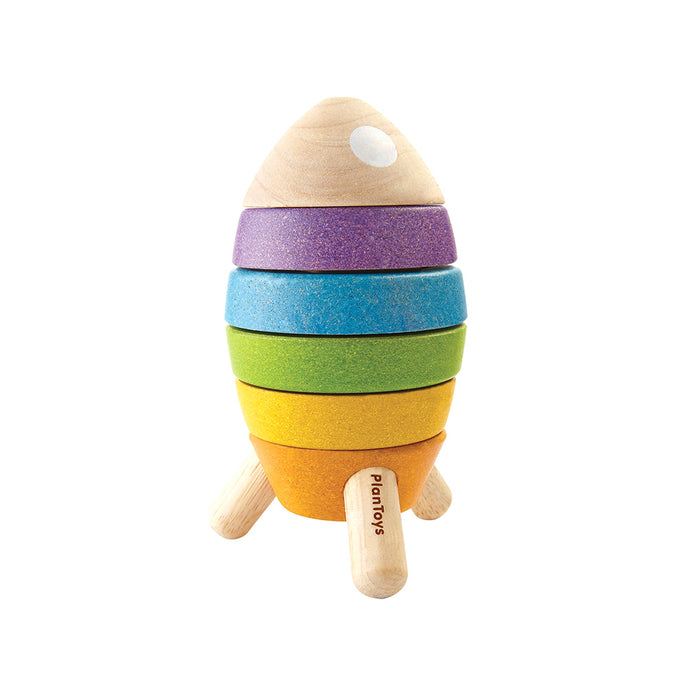 The PlanToys Wooden Sorting and Stacking Rocket features colorful purple, blue, green, yellow, and orange rings with three natural wood legs and a light wood tip—ideal for building fine motor skills and sparking imaginative play.