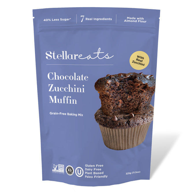 A blue bag of Stellar Eats Chocolate Zucchini Muffin Mix shows a chocolate muffin and highlights almond flour, paleo-friendly status, 40% less sugar, and being gluten, dairy, and grain free.