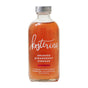 A clear glass bottle labeled Kosterina Crushed Strawberry Vinegar contains reddish liquid. The label says it’s great for dressings, cocktails, fruit salads, and mocktails, with no added sugar or artificial flavors. 8 fl oz (237 mL).