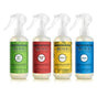 Four Mrs. Meyer's Summer Room Freshener Collection sprays are lined up, each with a different colored label: Fresh Cut Grass (green), Tomato Vine (red), Dandelion (yellow), and Blueberry (blue).