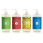 Four bottles from the Mrs. Meyer's Summer Hand Soap Collection are lined up, each with a colorful label: Fresh Cut Grass (green), Tomato Vine (red), Dandelion (yellow), and Blueberry (blue).