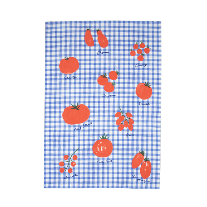 Supra Enduras Tomato Print Organic Cotton Kitchen Towel showcases vibrant red tomatoes with green stems, labeled Cherry and Beefsteak, on a blue and white checkered pattern. Made from GOTS organic cotton, it brings an artful touch of organic style to your kitchen.