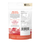 Back of The Honest Kitchen Instant Beef Dog Bone Broth with Turmeric package shows instructions, ingredients, guaranteed analysis, barcode, and a red barn and field illustration. Promotes adding nutrition and taste to your dog's food with this bone broth topper.