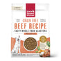A bag of The Honest Kitchen Dry Dog Food, Grain Free Beef Whole Food Clusters features a dog illustration, images of beef and vegetables, and text highlighting Minimally Processed Whole Food Clusters and Natural Food for Dogs.