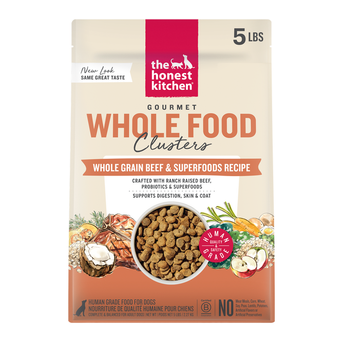 A 5-lb bag of The Honest Kitchen Dry Dog Food, Whole Grain Beef & Oat Whole Food Clusters, with ranch-raised beef and superfoods. Packaging shows food clusters and illustrations of wholesome ingredients.
