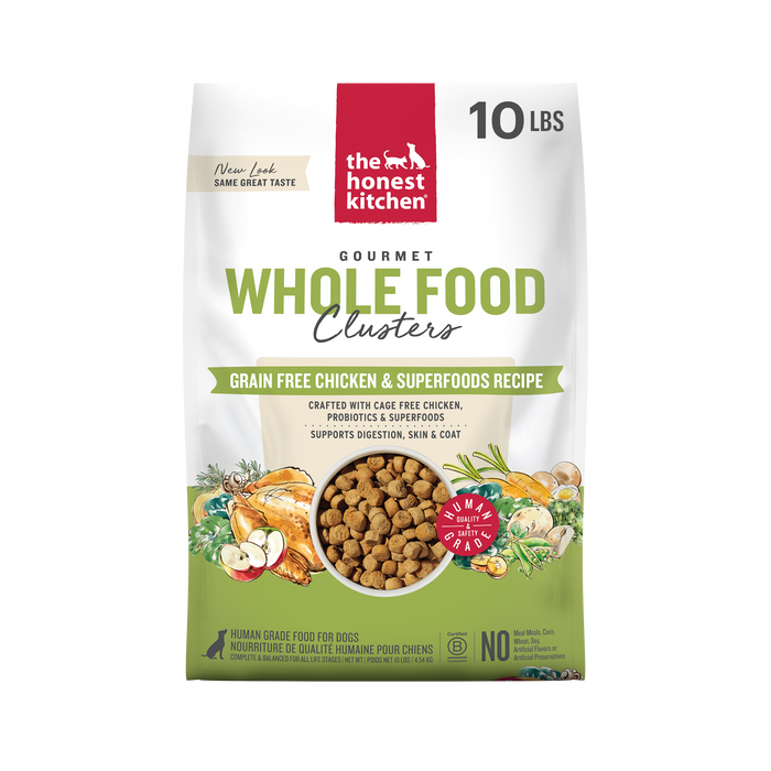 A 10-lb bag of The Honest Kitchen Dry Dog Food, Grain Free Chicken Whole Food Clusters, featuring cage-free chicken and superfoods. The packaging shows images of chicken, vegetables, and kibble.