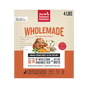 A 4-lb box of The Honest Kitchen Dehydrated Dog Food Whole Grain Beef displays beef, carrots, oats, and greens, with key benefits and feeding instructions highlighted on the front.