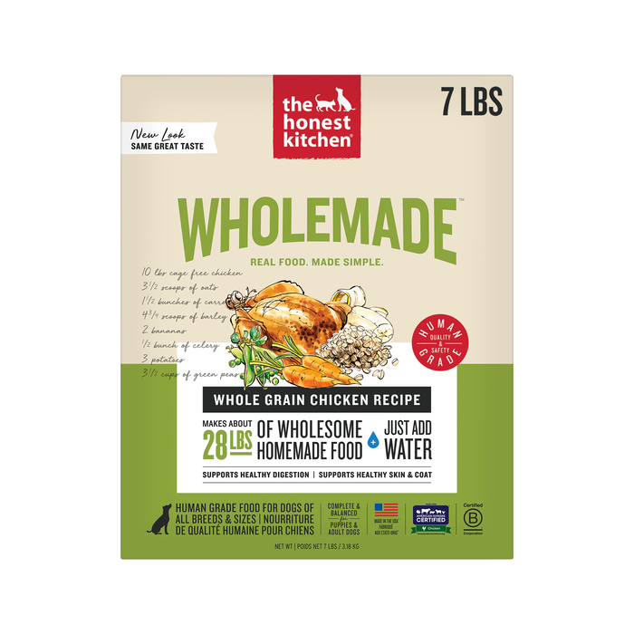 A 7 lb box of The Honest Kitchen Wholemade™ Whole Grain Chicken Dog Food features a yellow and white design with a chicken, vegetables, grains, and text highlighting its human grade quality and use of cage free chicken.