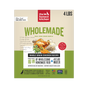 A 4 lb box of The Honest Kitchen Wholemade™ Whole Grain Chicken Dog Food—with images of chicken and veggies—makes 16 lbs of human grade, dehydrated food; just add water for a wholesome homemade meal.